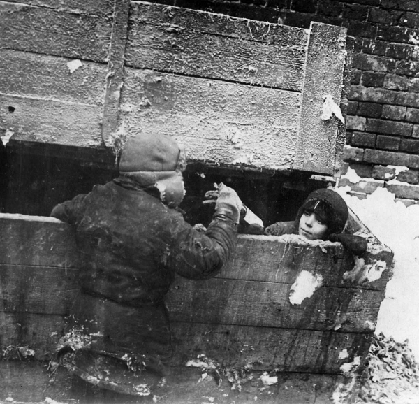 Homeless children in a cold basement, late 1920s. Photograph: Institute of Contemporary Russia